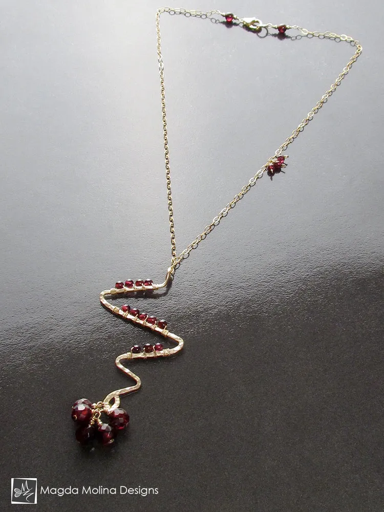 Gold Lightning Bolt And Garnet Necklace