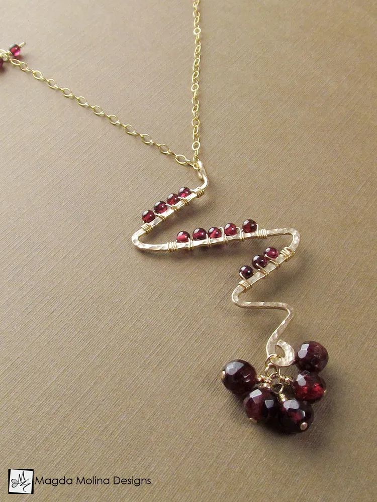 Gold Lightning Bolt And Garnet Necklace